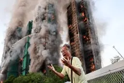 جزئیات آتش سوزی مرگبار در برج های مسکونی هنگ کنگ/ تعداد کشته‌ها و مصدومان اعلام شد