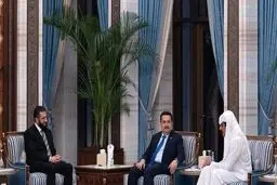 دیدار السودانی و الجولانی روی یک میز در قطر
