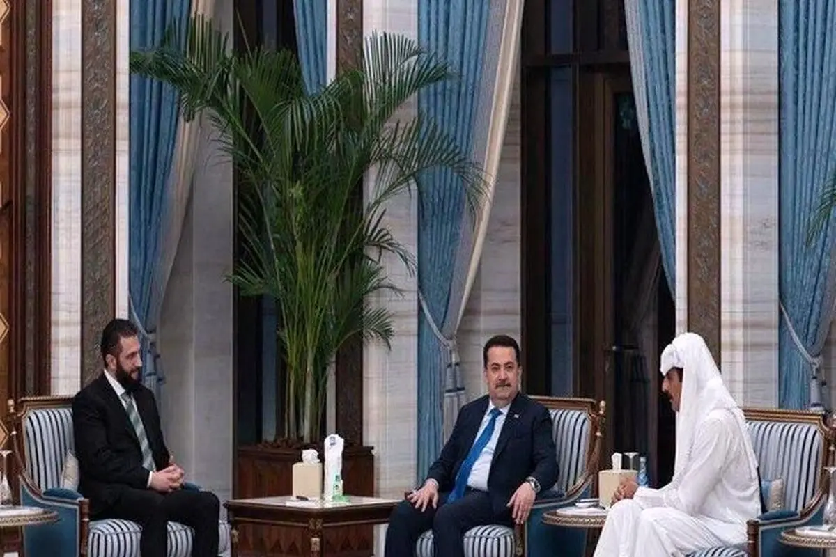 دیدار السودانی و الجولانی روی یک میز در قطر

