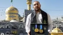 مصارع إیرانی یهدی میدالیتین ذهبیتین إلی متحف الحرم الرضوی