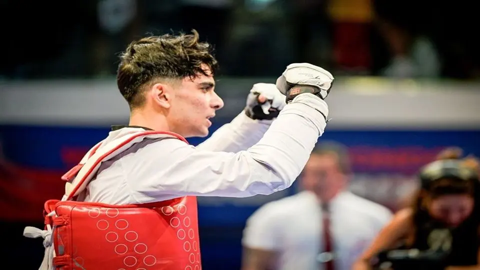 مراسم اهدای مدال طلا به ابوالفضل زندی در مسابقات تکواندو قهرمانی جهان