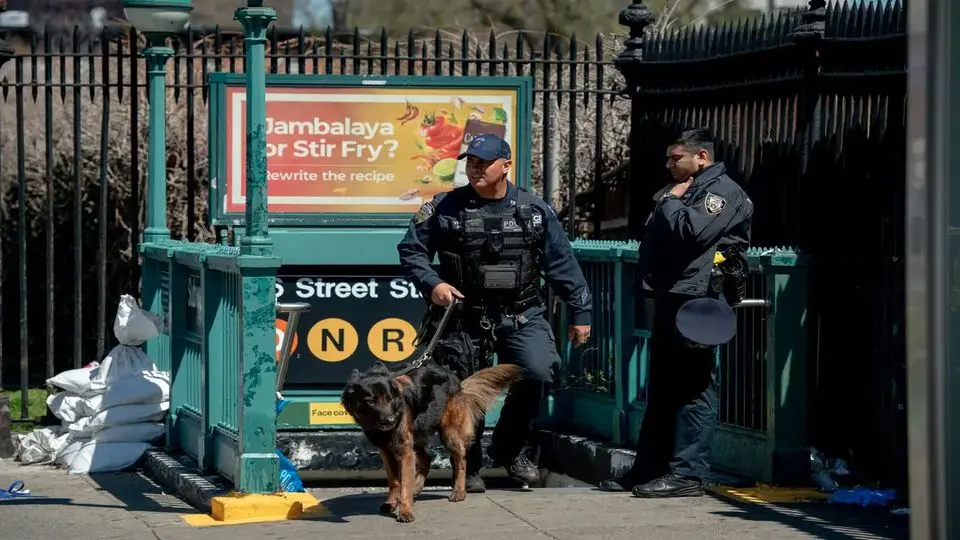 Subway Gunman Is Still at Large as New Yorkers Begin Commute