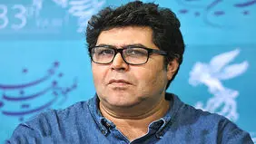 عکس یادگاری فرهاد اصلانی با دو نوازنده خیابانی 