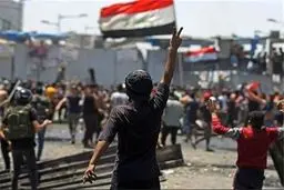 یک کشته و ده ها زخمی در درگیری با پلیس بغداد