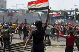 یک کشته و ده ها زخمی در درگیری با پلیس بغداد