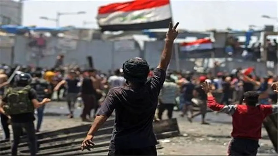 یک کشته و ده ها زخمی در درگیری با پلیس بغداد