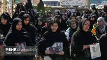 به خاک سپاری ۱۵ شهید یک خانواده البرزی در جنگ+ عکس