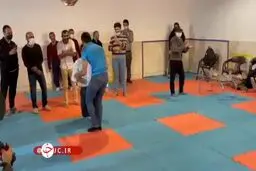 کشتی حسن یزدانی با نوجوان معلول آسایشگاه شهید بهشتی مشهد