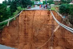 Heavy rains and flooding in South Africa kill 59 people and sweep away roads