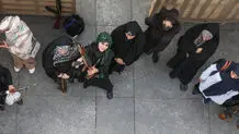 آموزش کار با سلاح به زنان در میدان امام حسین تهران + عکس