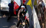 روحانی موتورسوار به سه ترک در زنجیره انسانی جان‌فدایان مشهد شرکت کرد + عکس