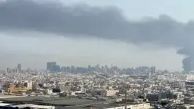 خسارت شدید به منازل مسکونی و‌ مغازه‌ها در میدان انقلاب تهران