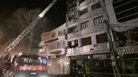نجات ۳ نفر از حریق ساختمان ۱۱ طبقه کرمانشاه
