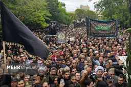 Huge crowd attend in President, FM funeral in Tabriz