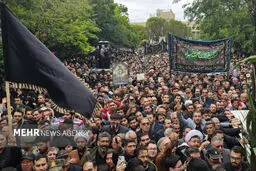 Huge crowd attend in President, FM funeral in Tabriz