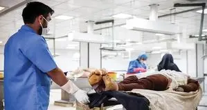پشت در سالن تشریح پزشکی قانونی : از زن سپیدپوش میدان تجریش تا چشمان یک پیکر 