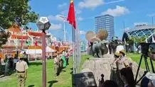 پرچم ایران در دهکده بازیهای آسیایی به اهتزاز در آمد