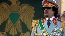 عکس دیده‌نشده از شیوه غذا خوردن معمر قذافی در خلوت!