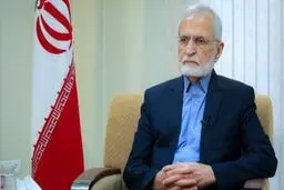 تصویری دیده نشده از دوران جوانی شهید کمال خرازی با کروات/ معاون وقت وزارت خارجه در کنار بازرگان و قطب زاده