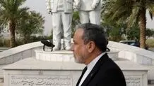 عراقچی در بدود ورود به بغداد به یادماان سردار سلیمانی و ابومهدی مهندس ادای احترام کرد + عکس