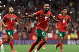 لاعبو المغرب یرفعون علم فلسطین احتفالا بالفوز على إسبانیا 