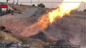 آتش سوزی خط لوله گاز در یک جاده مشهد