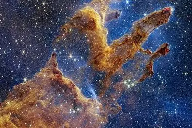 ستون‌های آفرینش واقع در سحابی عقاب، از چشم تلسکوپ فضایی جیمز وب