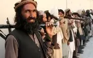 طالبان با تبر آلات موسیقی را نابود کرد / ویدئو

